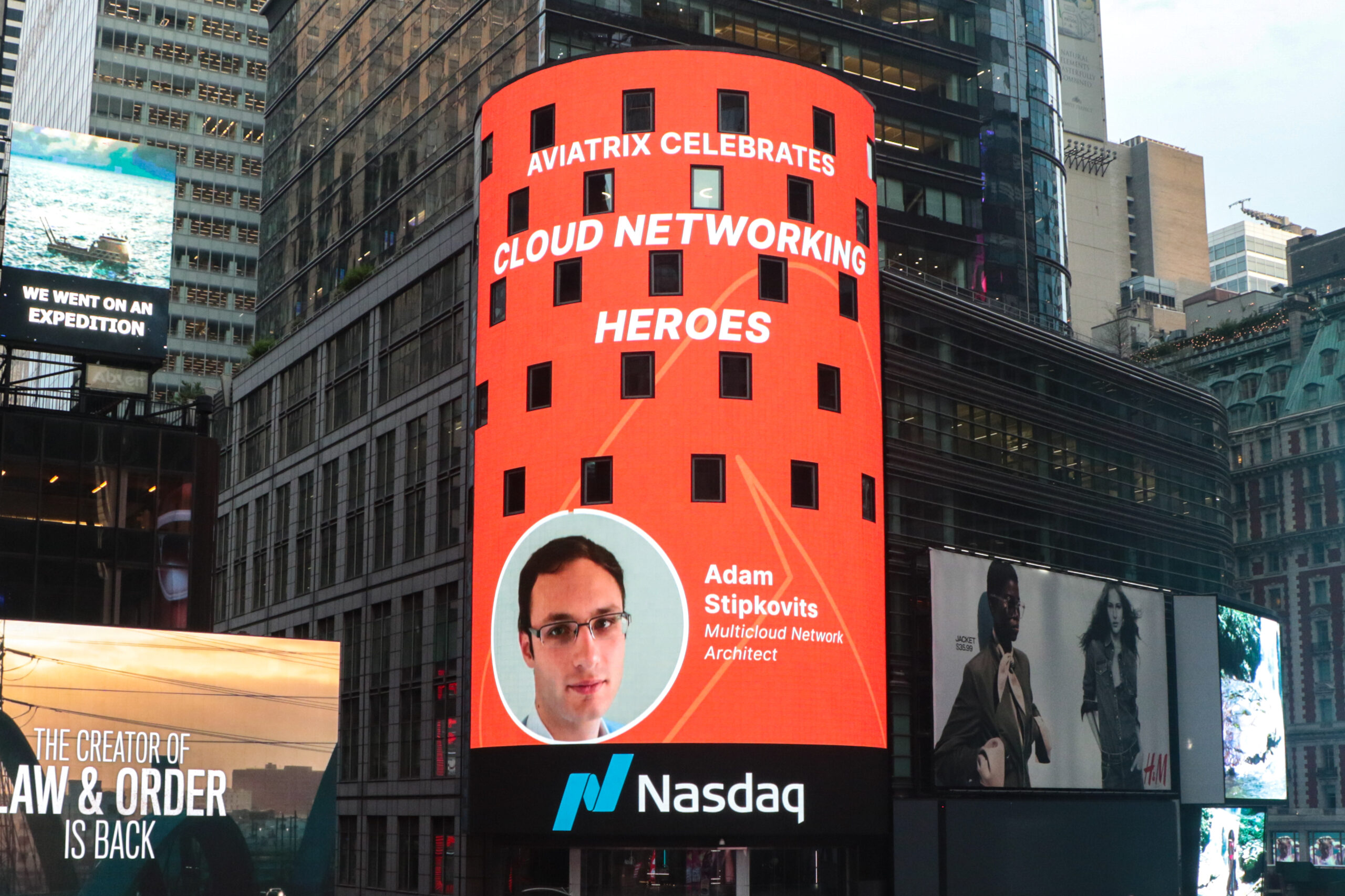 Photo of Adam Stipkovits on the Nasdaq tower