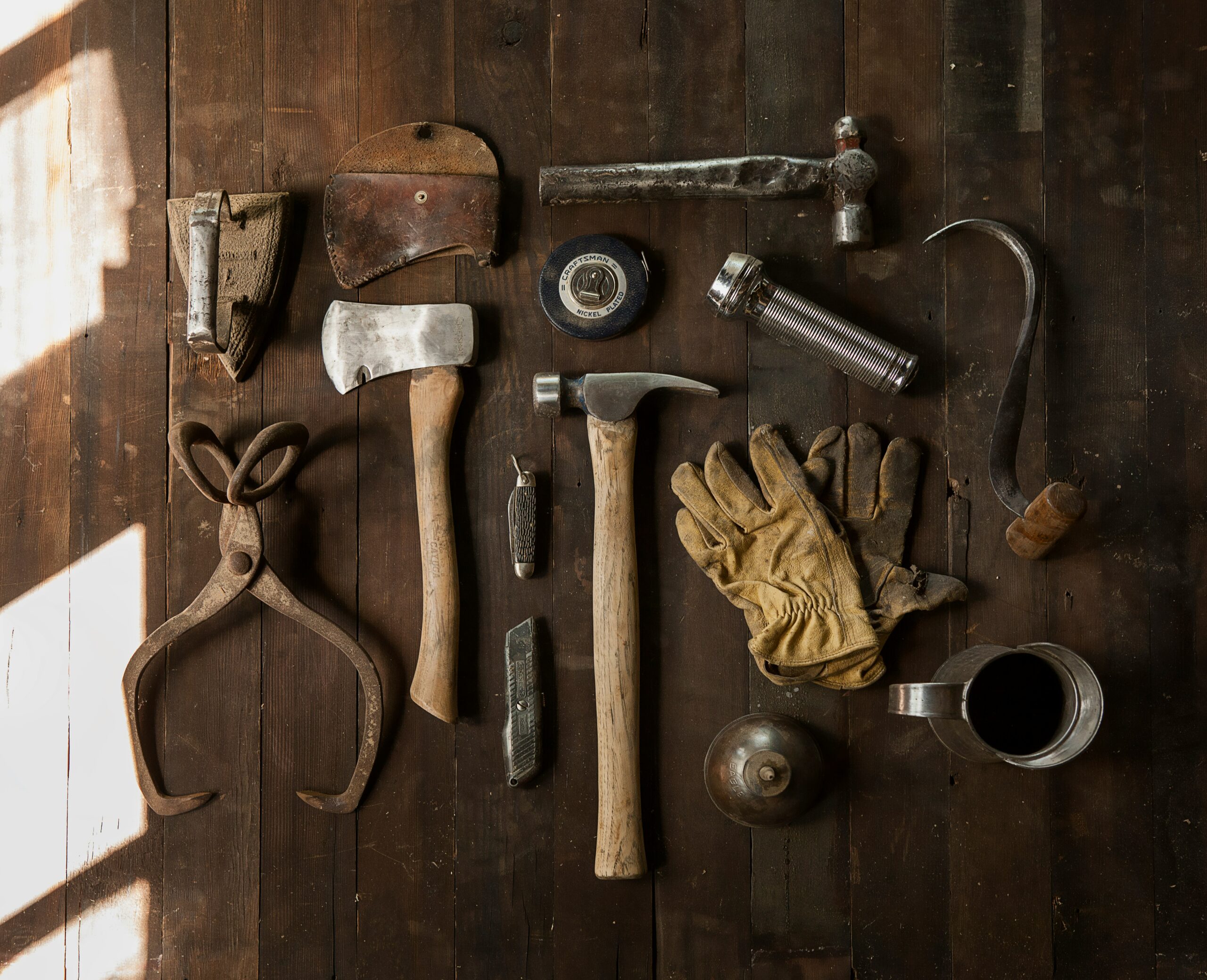 To Drive in a Nail, You Need a Hammer: How Aviatrix is Using AI Internally; image of tools on a table